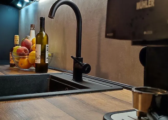 With Garden Hébergement de vacances *